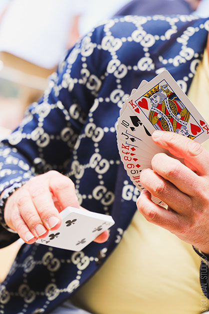 A fan of playing cards held open, the King of Hearts turned to the front